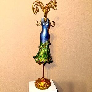 Peacock jewelry holder. Green and purple with gold tones.